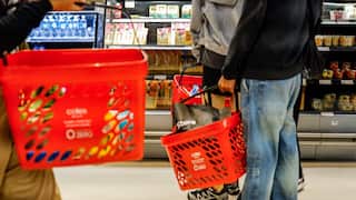 People with shopping baskets