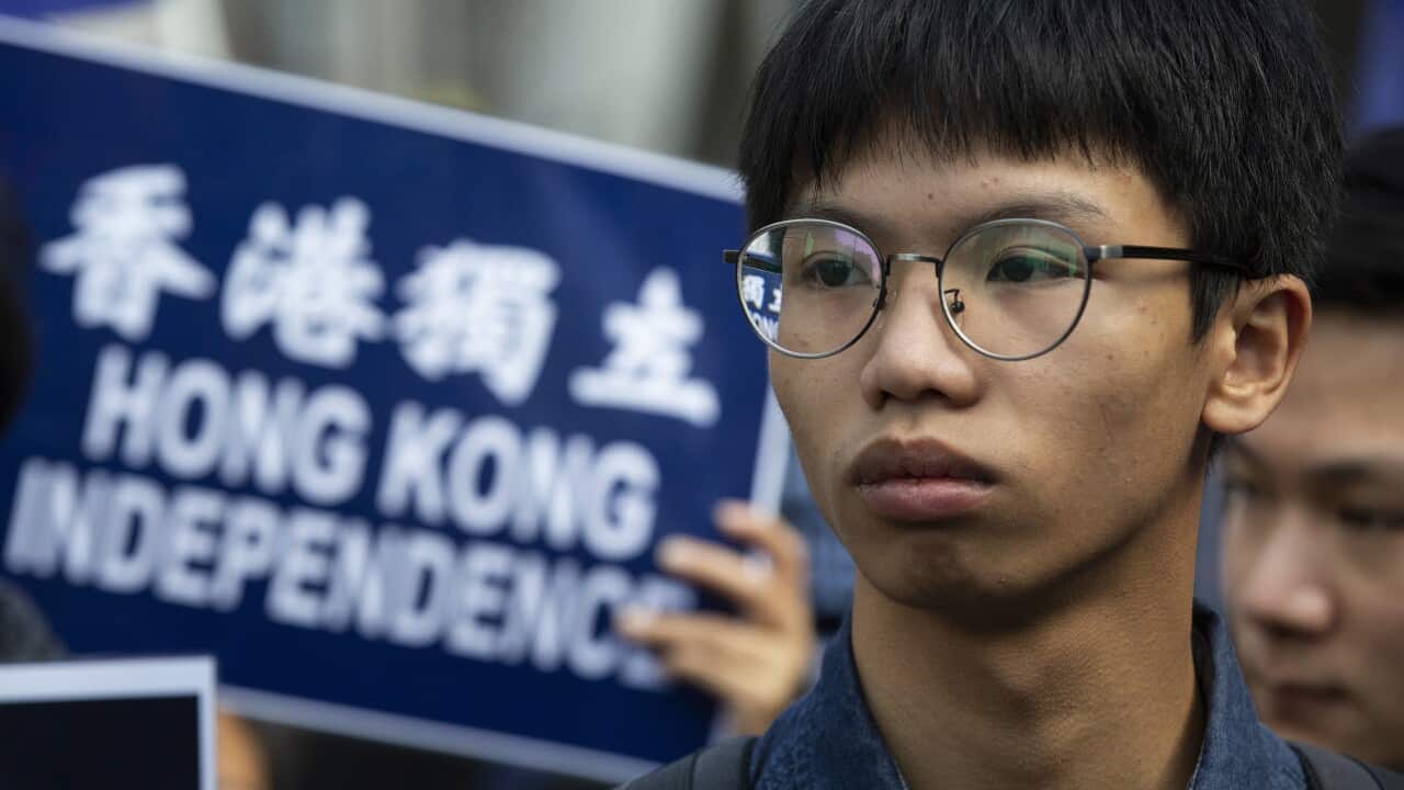 Tony Chung marches through the streets of Hong Kong during a protest in January 2019.