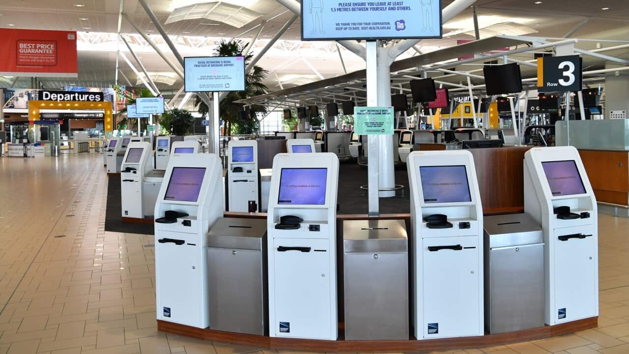 Empty check-in counters at Brisbane International Airport