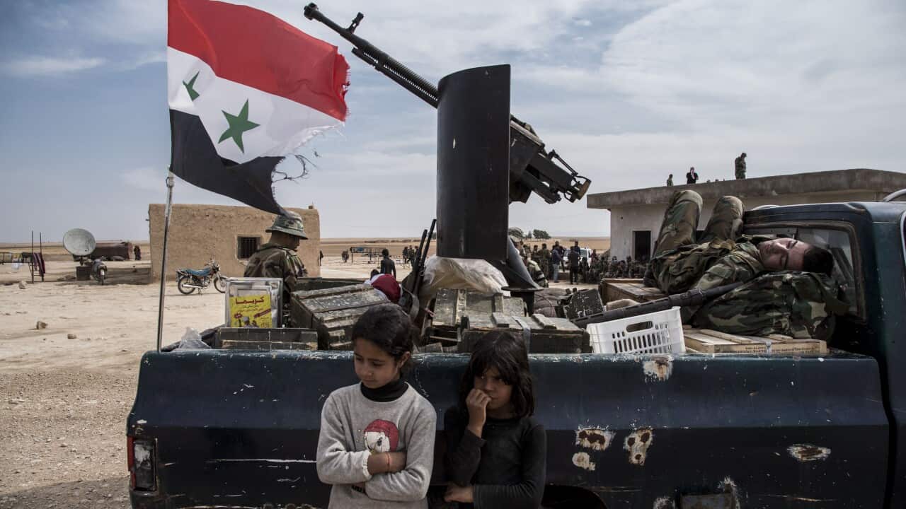 Syrian government forces deployed near the town of Tal Tamr, north Syria.