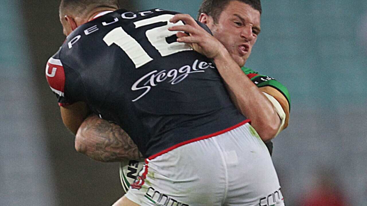 Sonny Bill Williams (L) during the Rooster's season opener