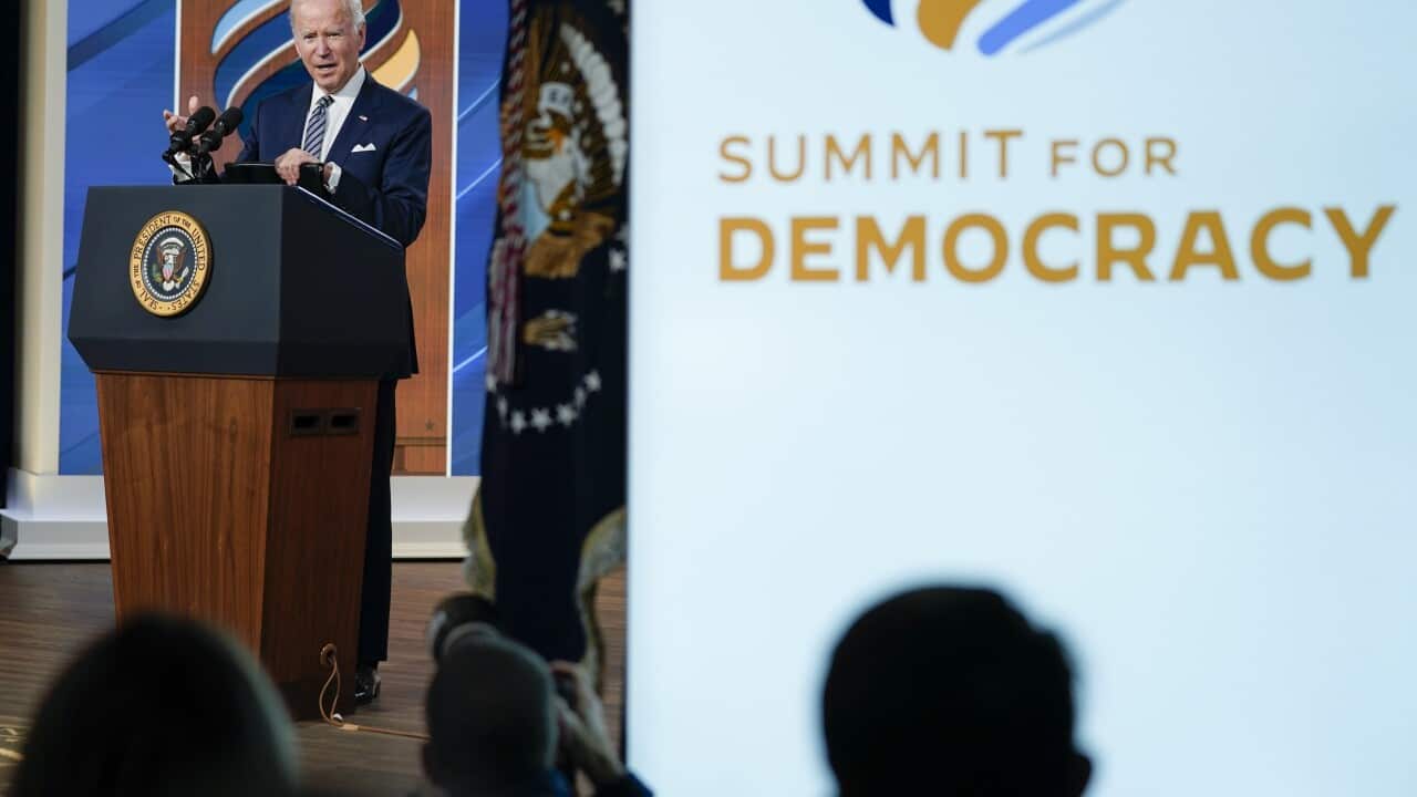 President Joe Biden delivers closing remarks to the virtual Summit for Democracy, in the South Court Auditorium on the White House campus.