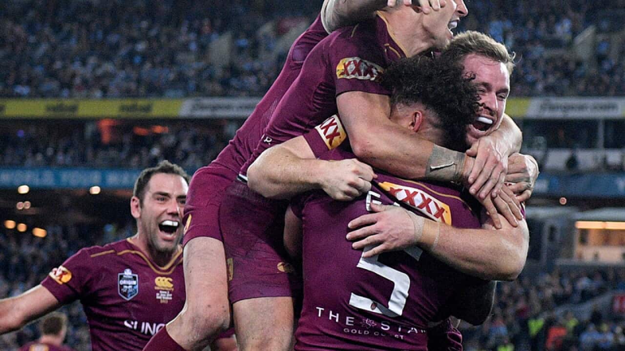 Dane Gagai celebrates with Maroons team mates