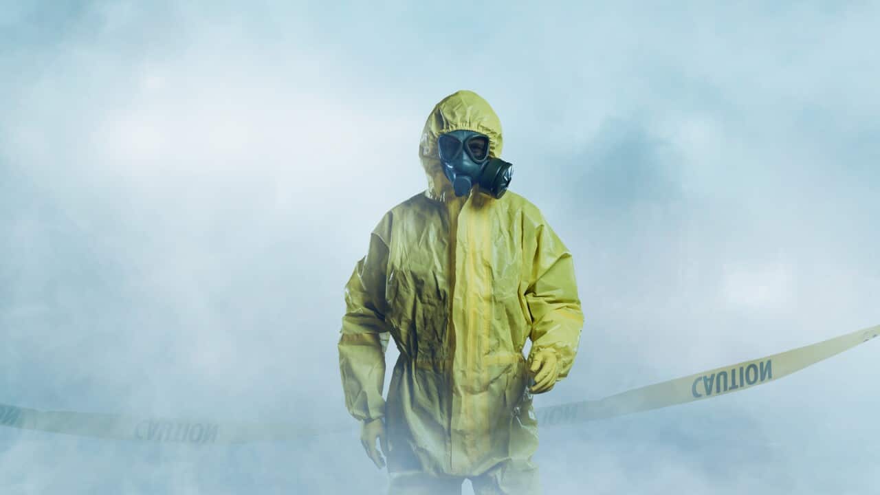 Worker in protective suit