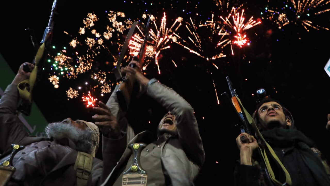 Fireworks burst as Houthi supporters rally against the Saudi-led coalition in Sanaa, Yemen, Monday, July 20, 2026.