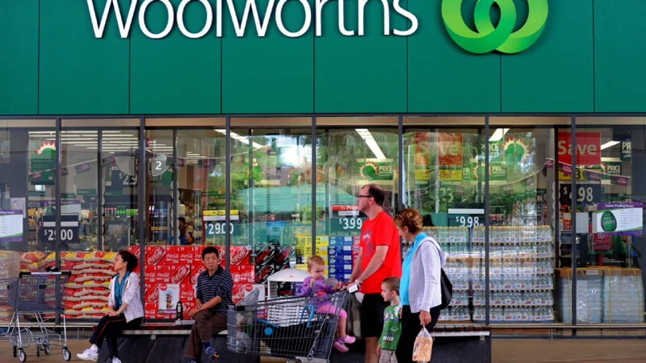 Shoppers outside a Woolworths grocery store in Brisbane