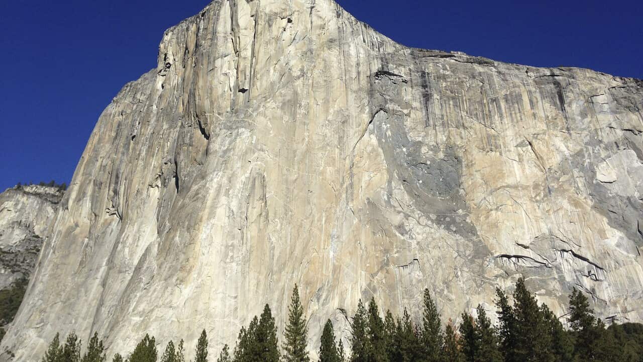 Two climbers vying to become the first in the world to use only their hands and feet to scale El Capitan make their way to the summit Wed, Jan. 14, 2015, in Yosemite National Park, Calif. (AP Photo/Ben Margot)