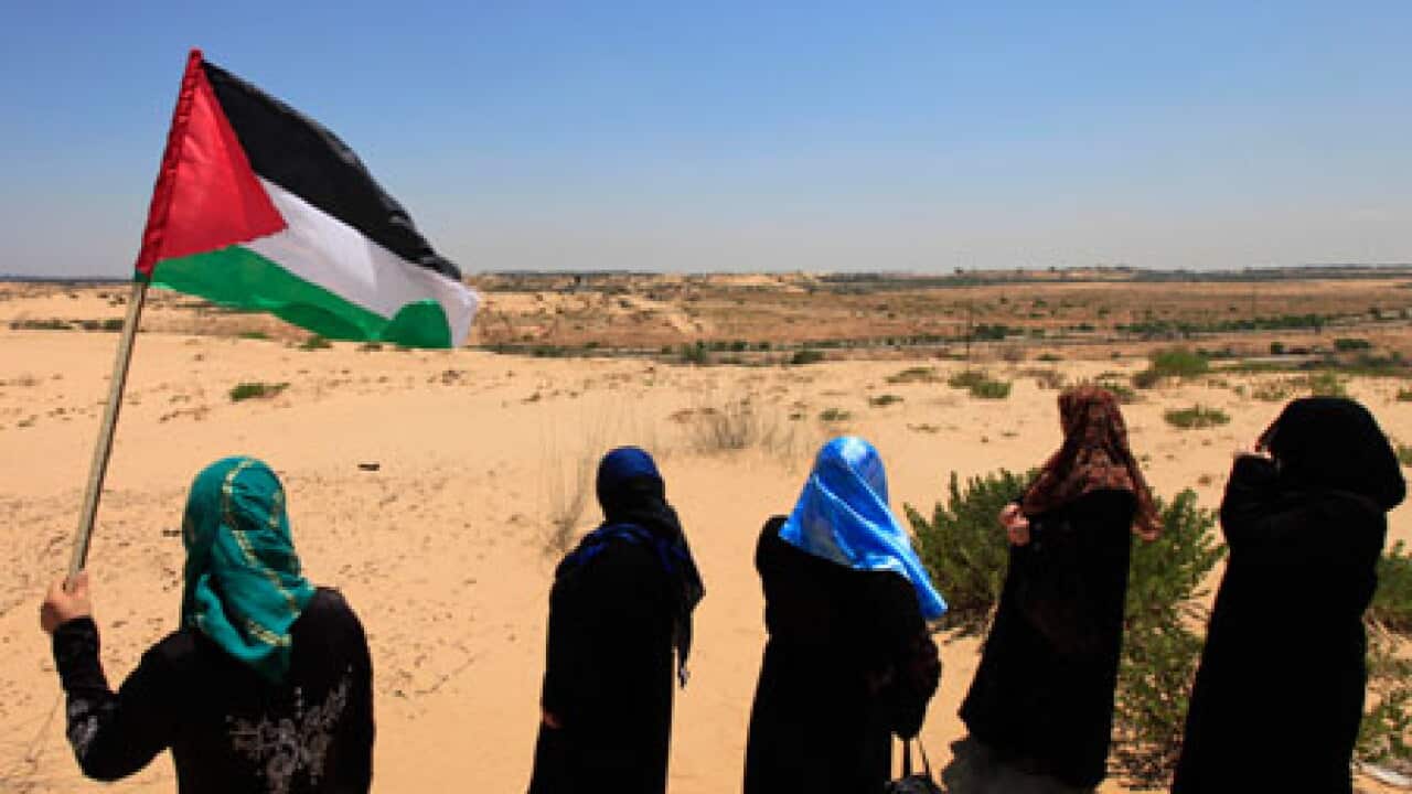 gaza_women_flag_100617_B_AP_1377601839