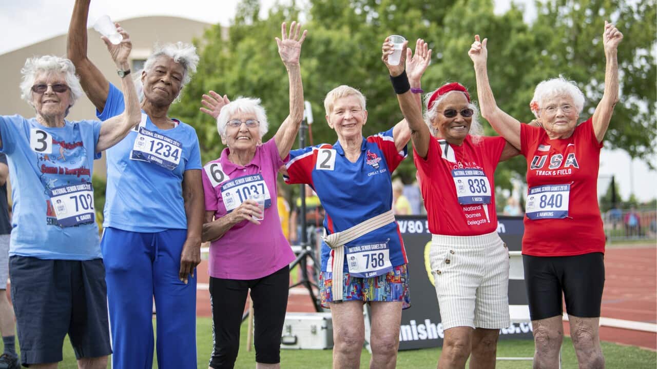 In this photo provided by the National Senior Games Association, competitors in the 90+ age division, including 103-year-old Julia Hawkins, of Baton Rouge, La., far right, wave to the crowd after their 50-meter race at the 2019 National Senior Games in Al
