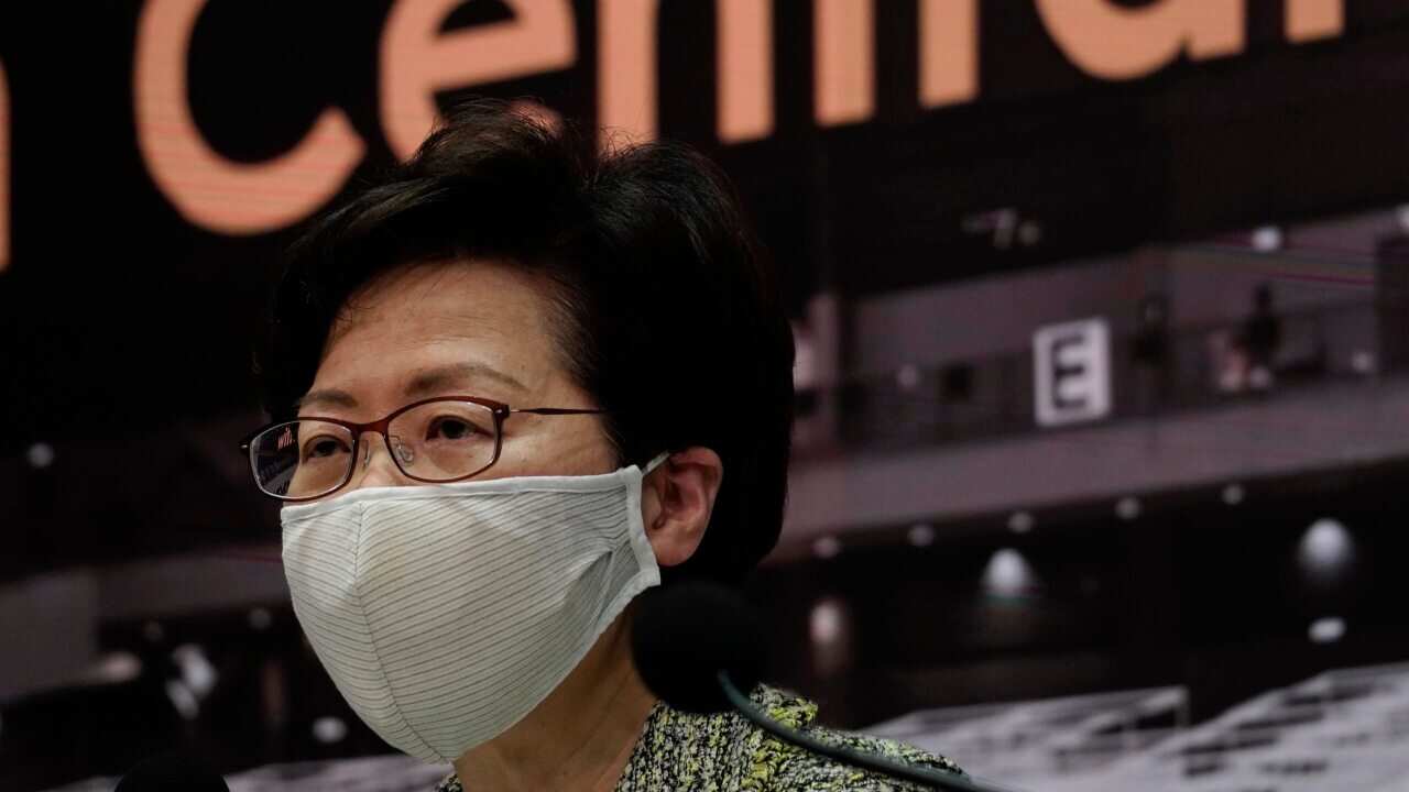 Hong Kong Chief Executive Carrie Lam listens to reporters' questions during a press conference in Hong Kong, Friday, Aug. 7, 2020.