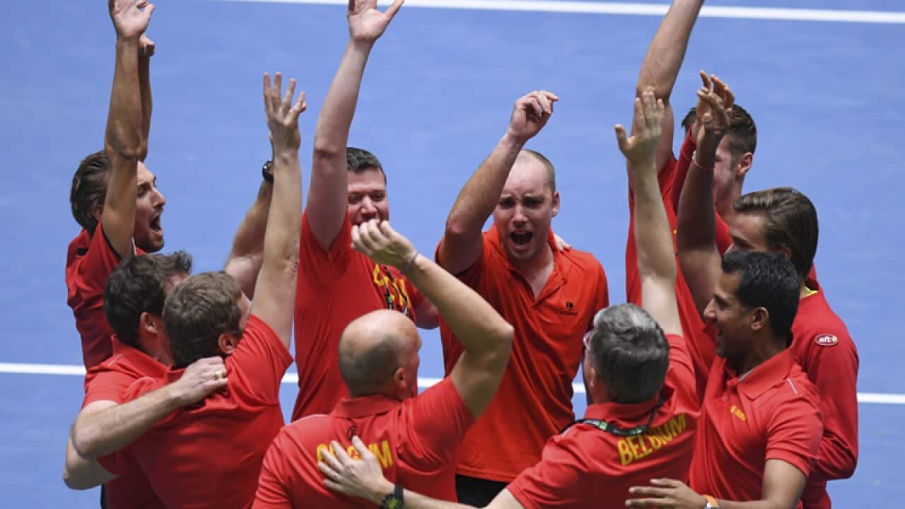 Belgium tennis players celebrate after winning their Davis Cup tie