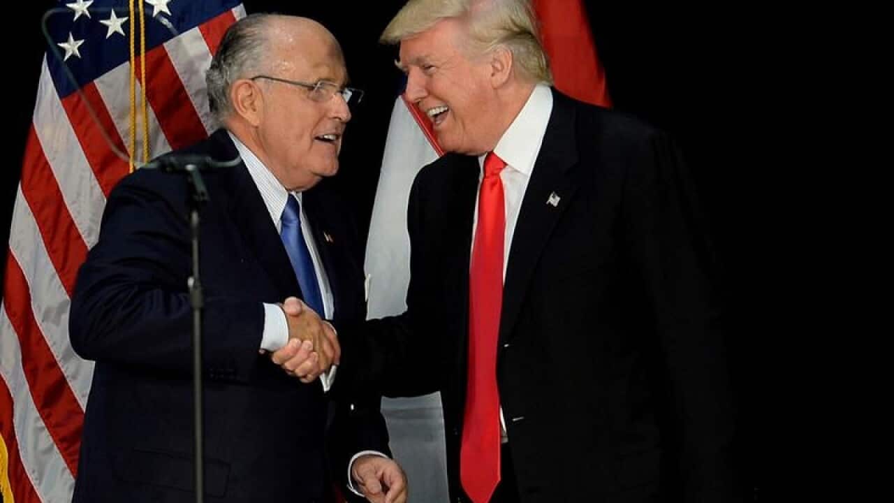 A file image of Rudy Giuliani and Donald Trump