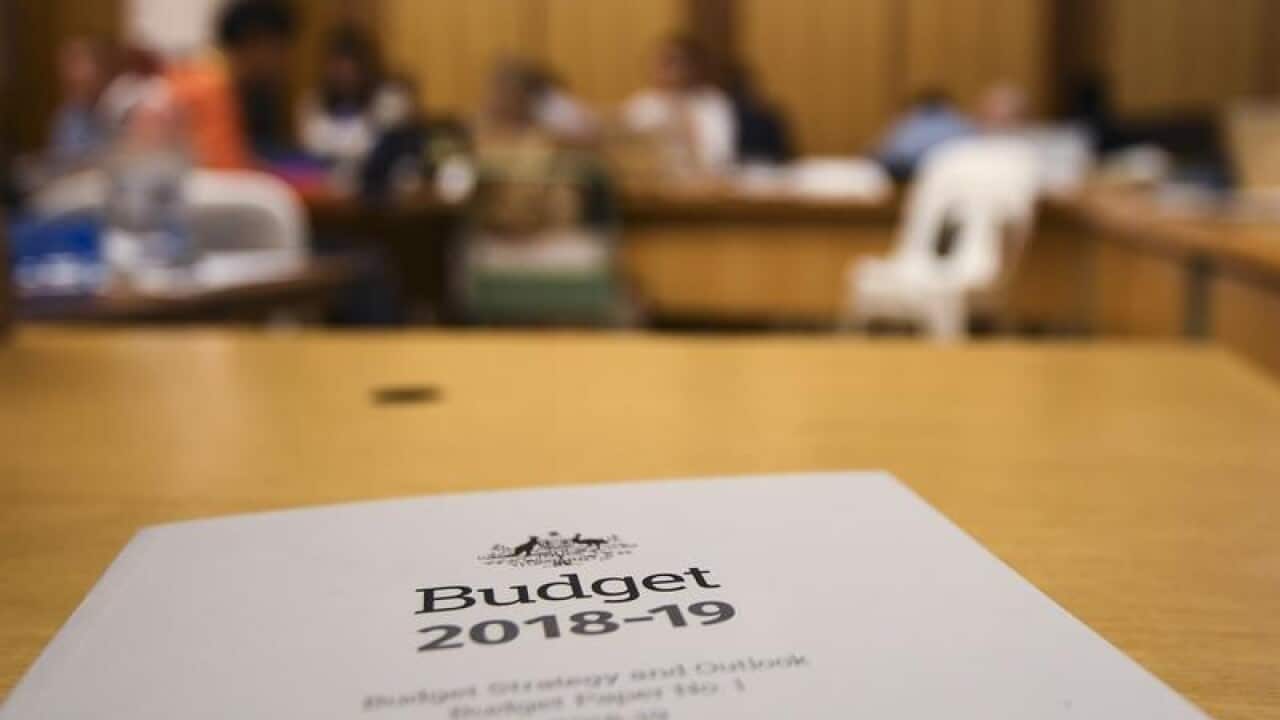 The cover of the Budget papers is seen inside the 2018 Budget Lockup.