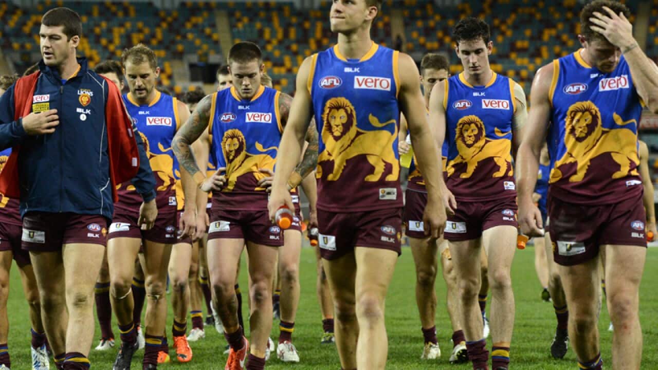 Brisbane Lions walks off the field.