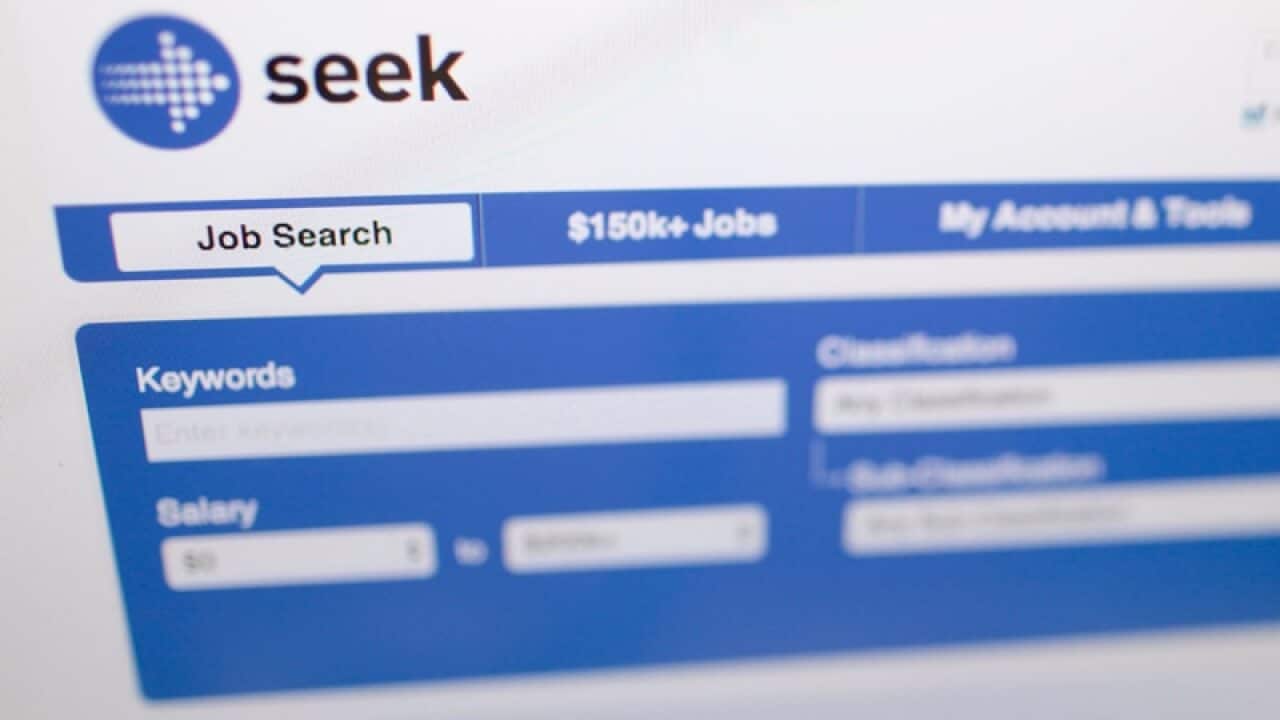 The website of online job search engine 'Seek' is seen on a screen