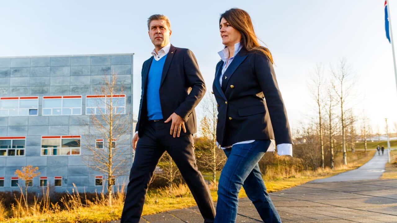 Iceland Prime Minister and leader of the Independence party Bjarni Benediktsson with his wife Thora Margret Baldvinsdottir as they arrive to vote in Gardabaer.
