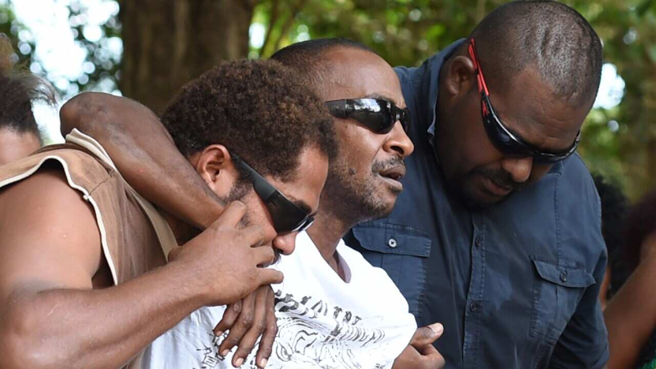 A man presumed to be the father of some of eight children