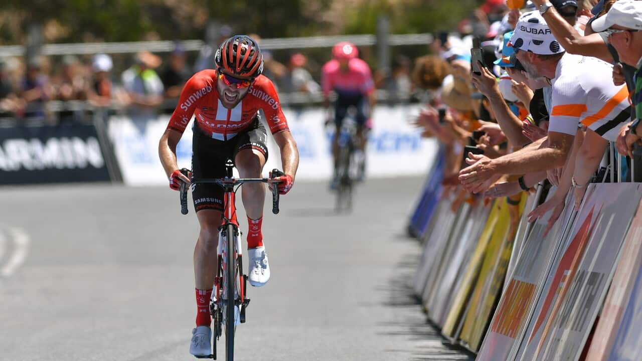 Chris Hamilton (Team Sunweb) in full grimace on Willunga Hill, his efforts seeing him to top six GC finish (Getty)