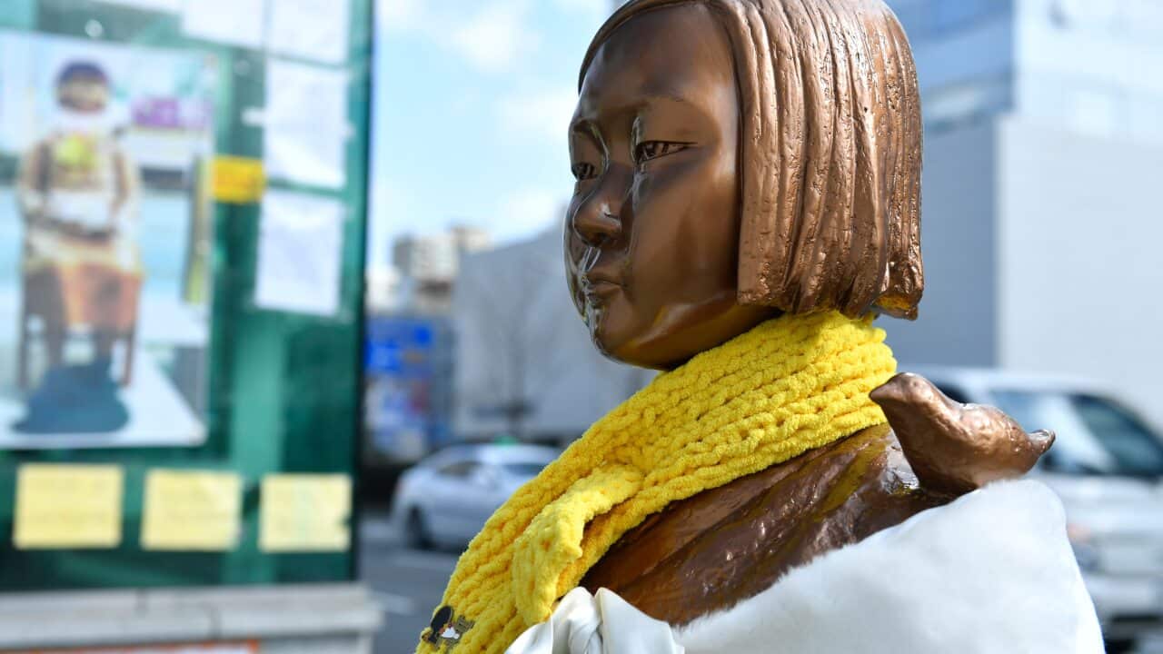 The statue of a girl who is symbolic of 'comfort women' is seen in front of the Japanese consulate-general in Busan, South Korea.