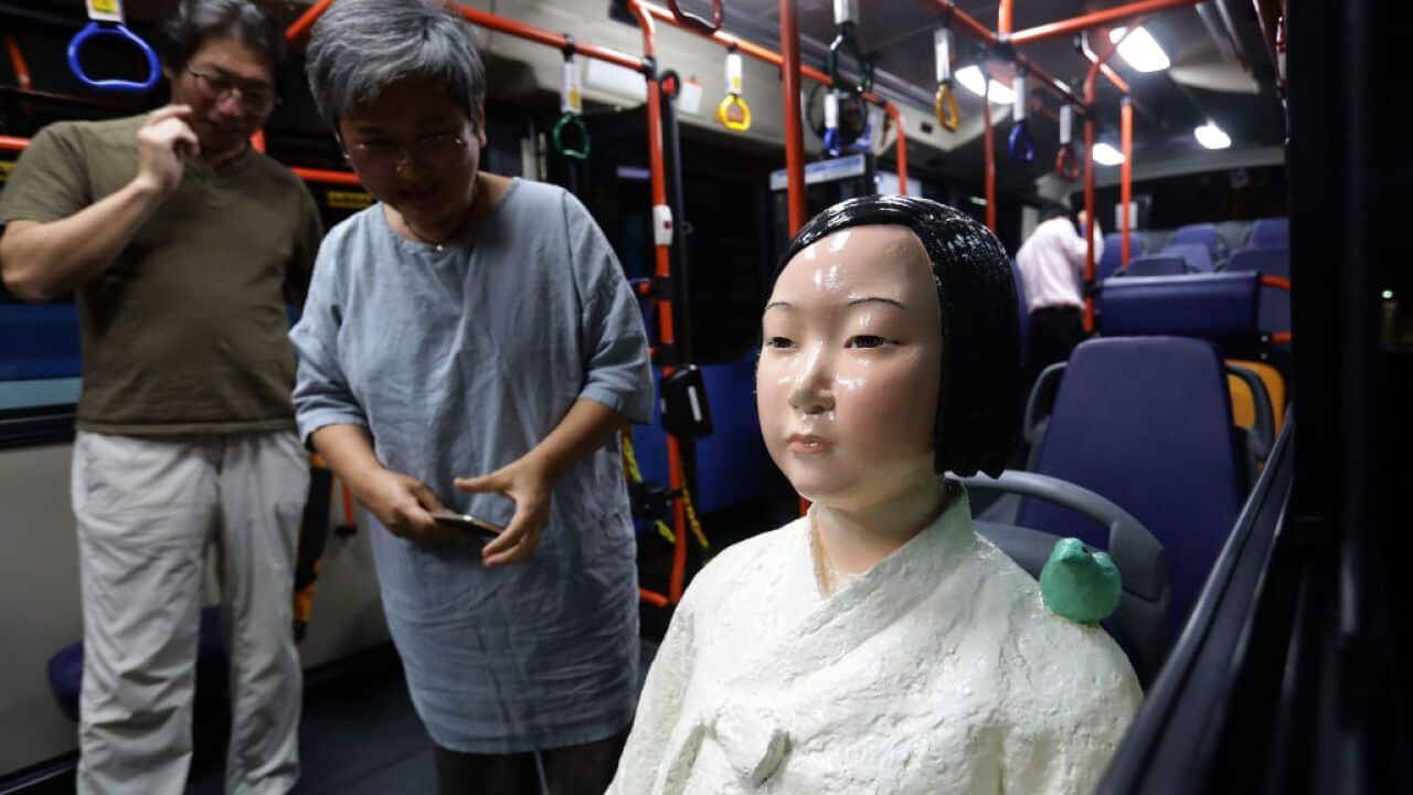 Comfort women statue on bus in South Korea