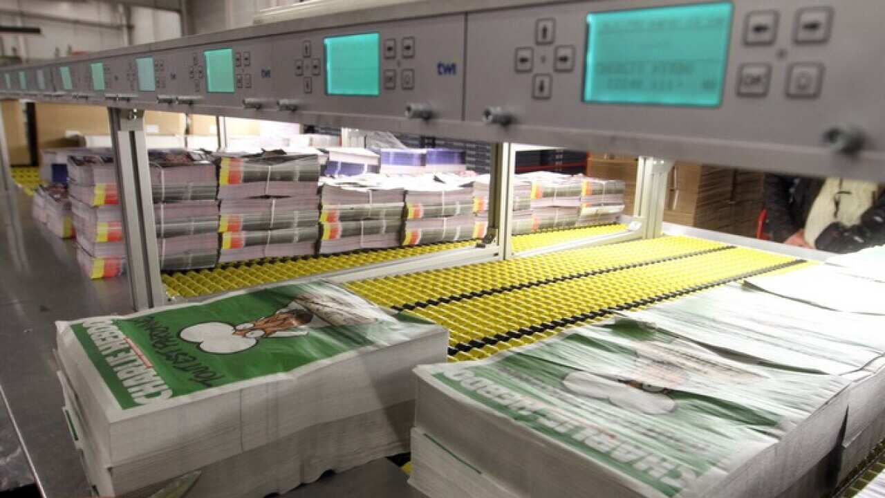 Copies of the latest edition of French satirical magazine Charlie Hebdo.