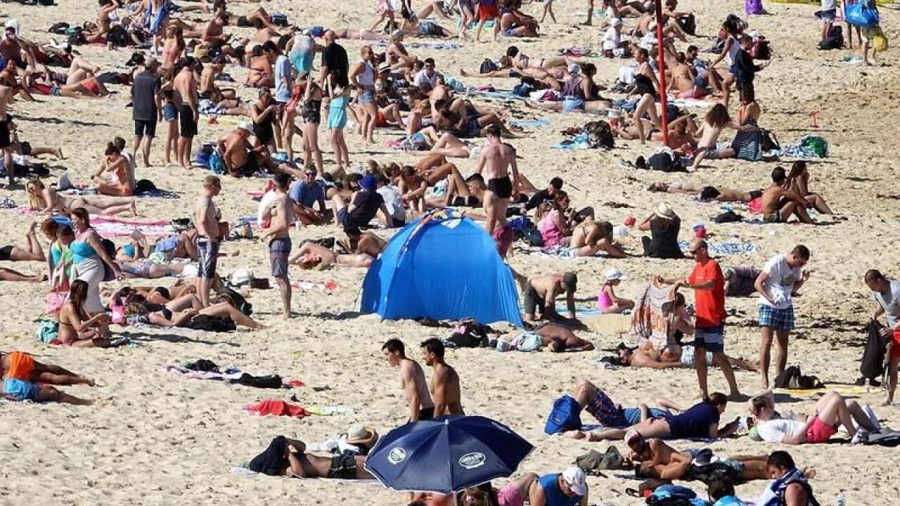 General view as beachgoers enjoy the warm spring weather