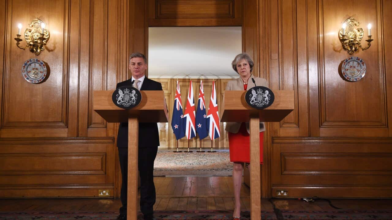 Britain's Prime Minister, Theresa May (L) and New Zealand, Prime Minister, Bill English (R) speak to reporters during a joint press conference at 10 Downing street in London