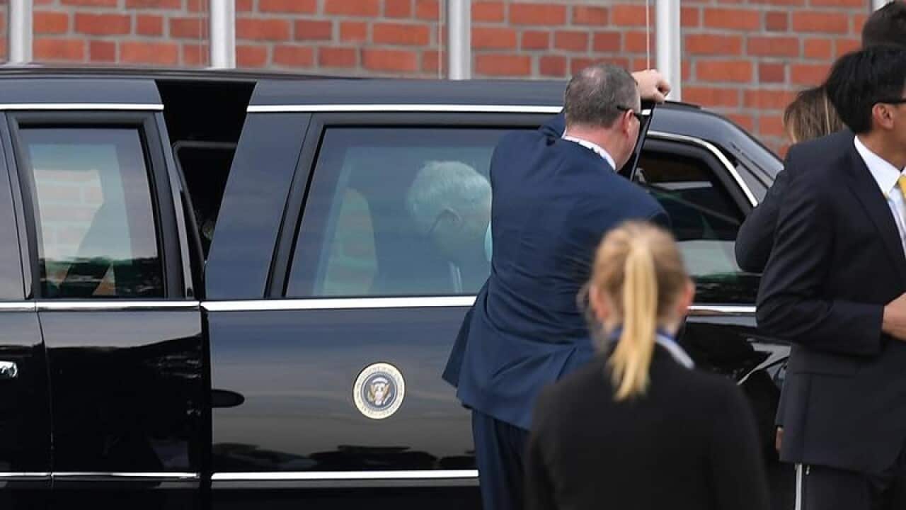 Malcolm Turnbull entering US President Donald Trump's car