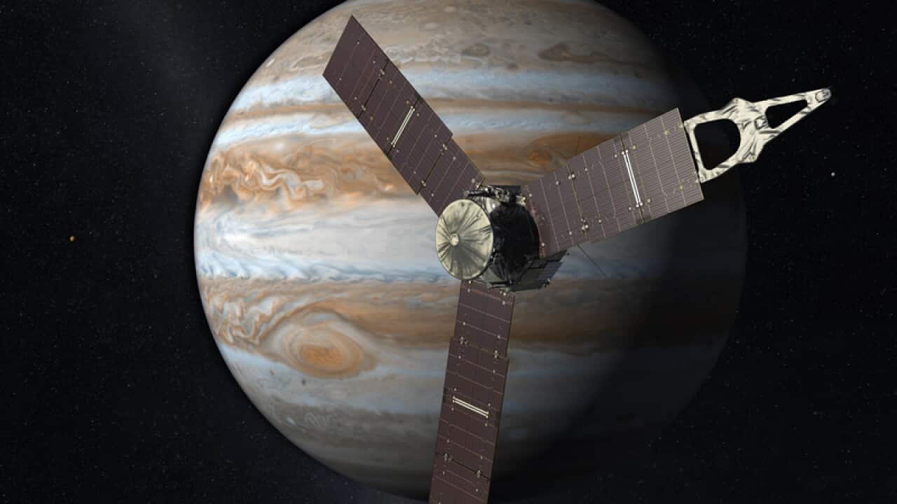 Juno spacecraft above the planet Jupiter