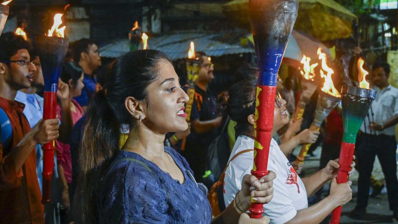India: Junior Doctors Hold Torch Rally Protest Against Sexual Assault And Murder Of Kolkata Doctor