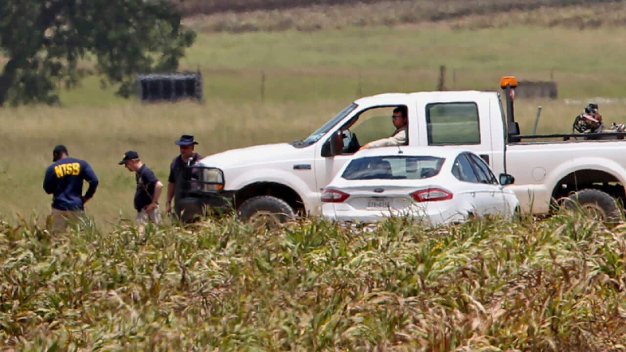 Investigators at the scene of an air balloon crash in Texas