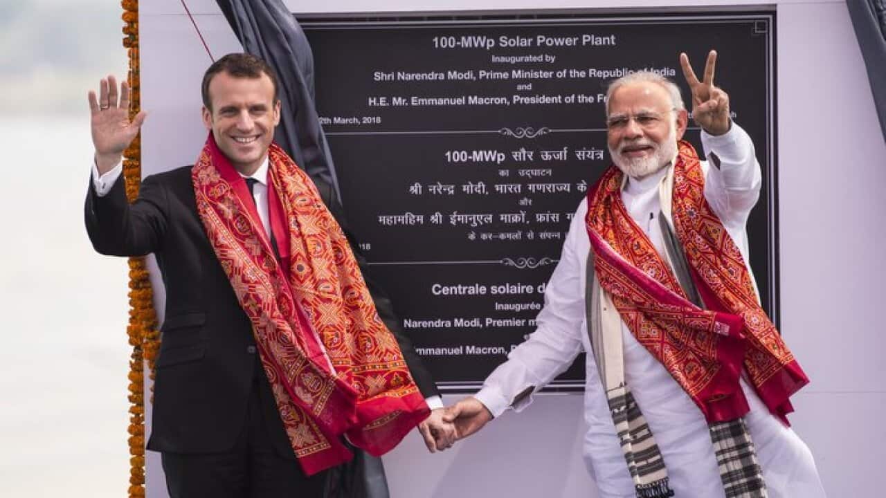 Indian Prime Minister Narendra Modi and French President Emmanuel Macron in Mirzapur in Uttar Pradesh state on March 12, 2018.