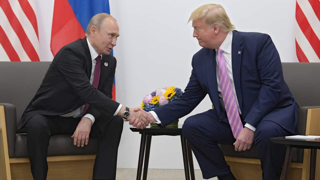 Russian President Vladimir Putin and then-US President Donald Trump during the 2019 G20 Summit in Japan.