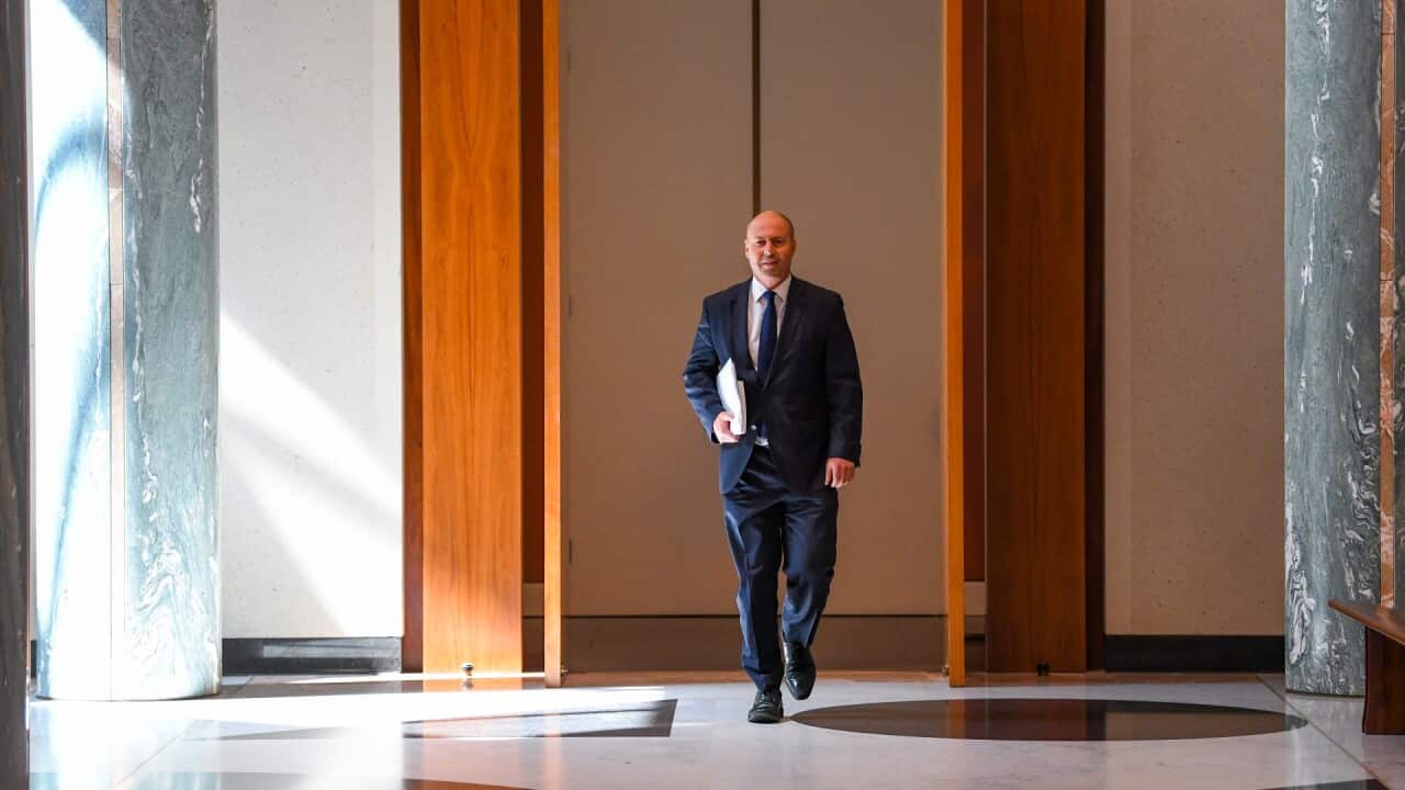 Australian Treasurer Josh Frydenberg arrives to deliver his post budget National Press Club