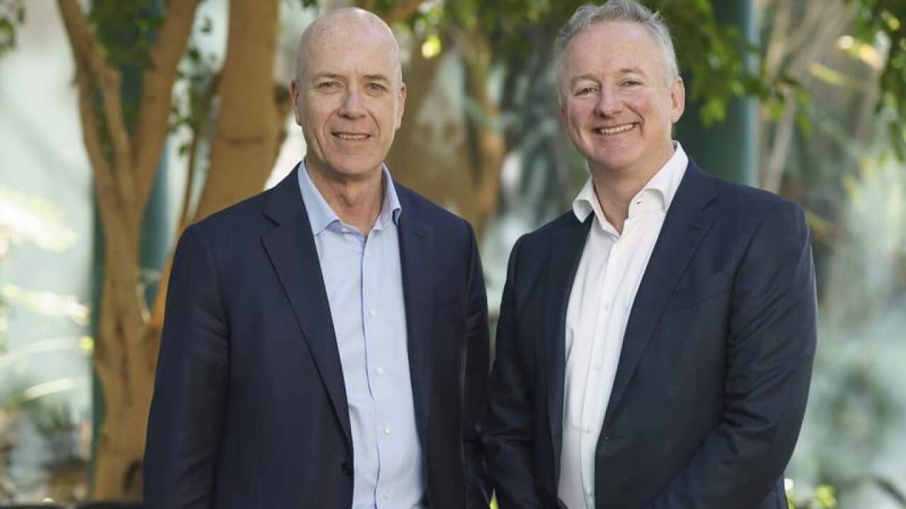 Nine CEO Hugh Marks (right) and Fairfax counterpart Greg Hywood