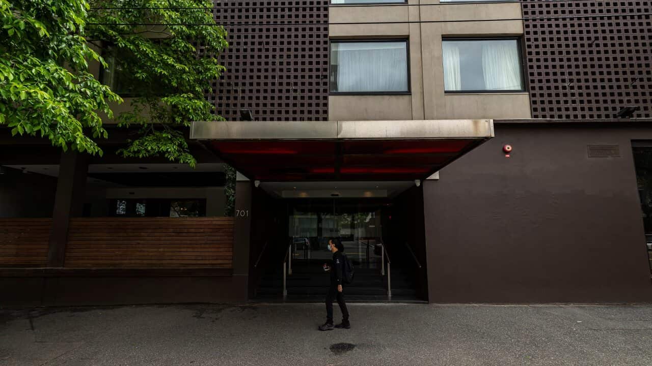 A person walks past the Park Hotel in Carlton