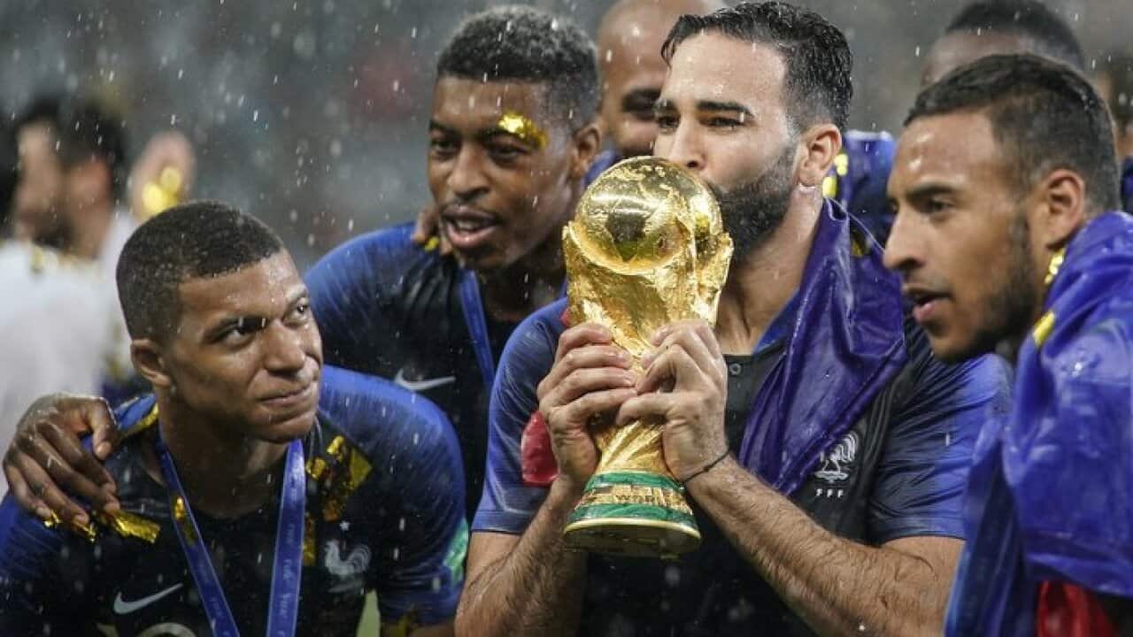 Kylian Mbappe of France celebrates with the trophy after the 2018 FIFA World Cup Russia Final between France and Croatia.