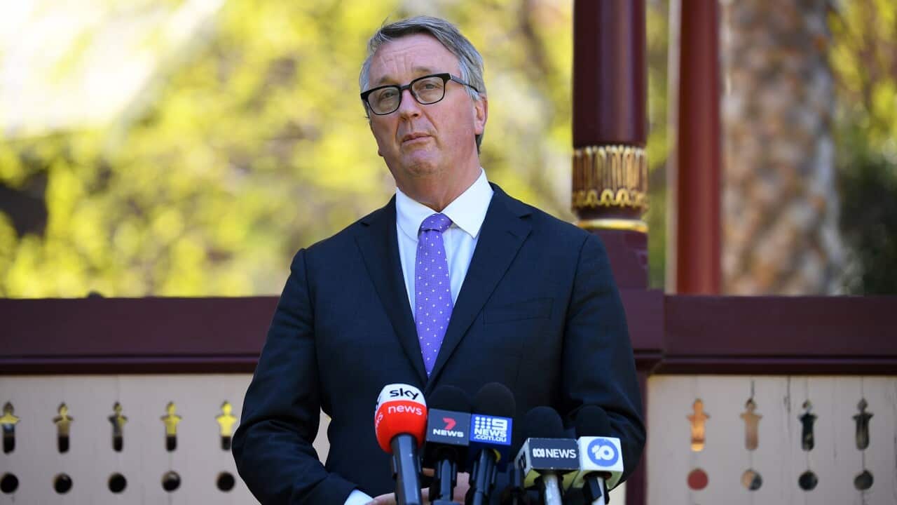 Victorian Health Minister Martin Foley addresses the media