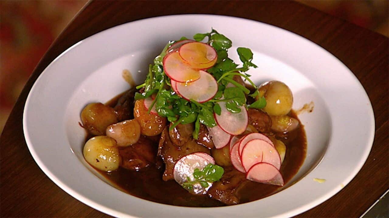 Sautéed chicken livers served with watercress and radish salad