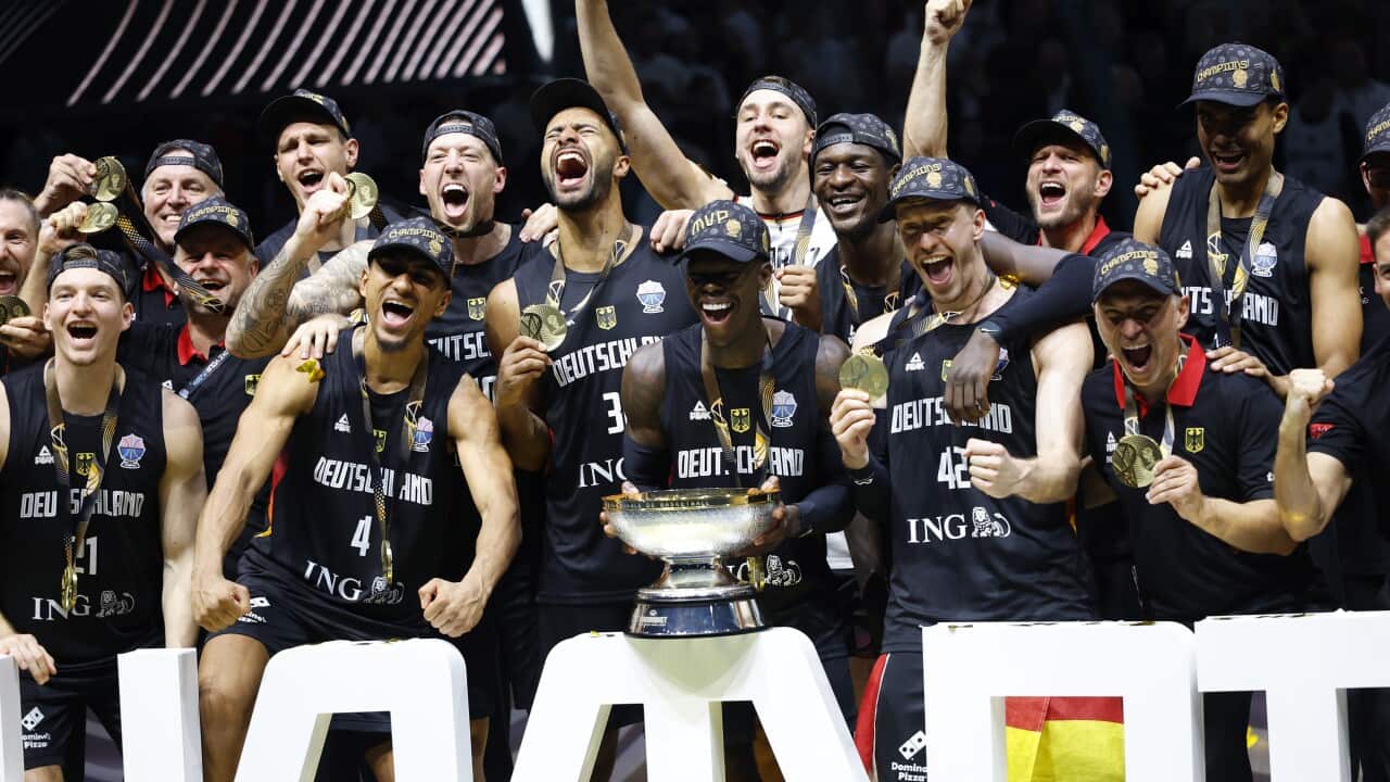 Germany's players celebrate with their gold medals after winning the gold medal match of the FIBA EuroBasket 2025 between Turkey and Germany in Riga, Latvia, 14 September 2025