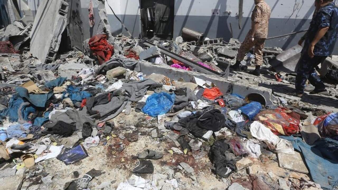 The aftermath of an airstrike on a Libyan migrant detention centre