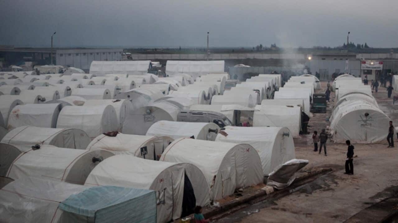 syria refugees_210613_l_856975324