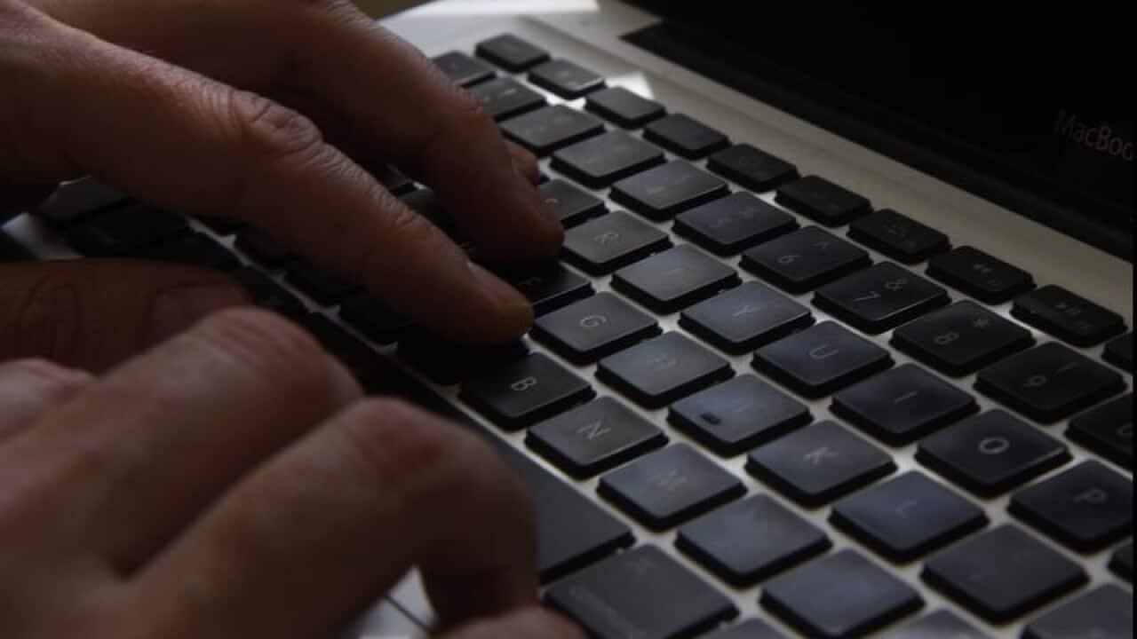 A man using a laptop