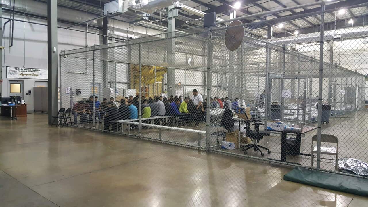 U.S. Border Patrol agents conduct intake of illegal border crossers at the Central Processing Center on June 17, 2018 in McAllen, Texas.