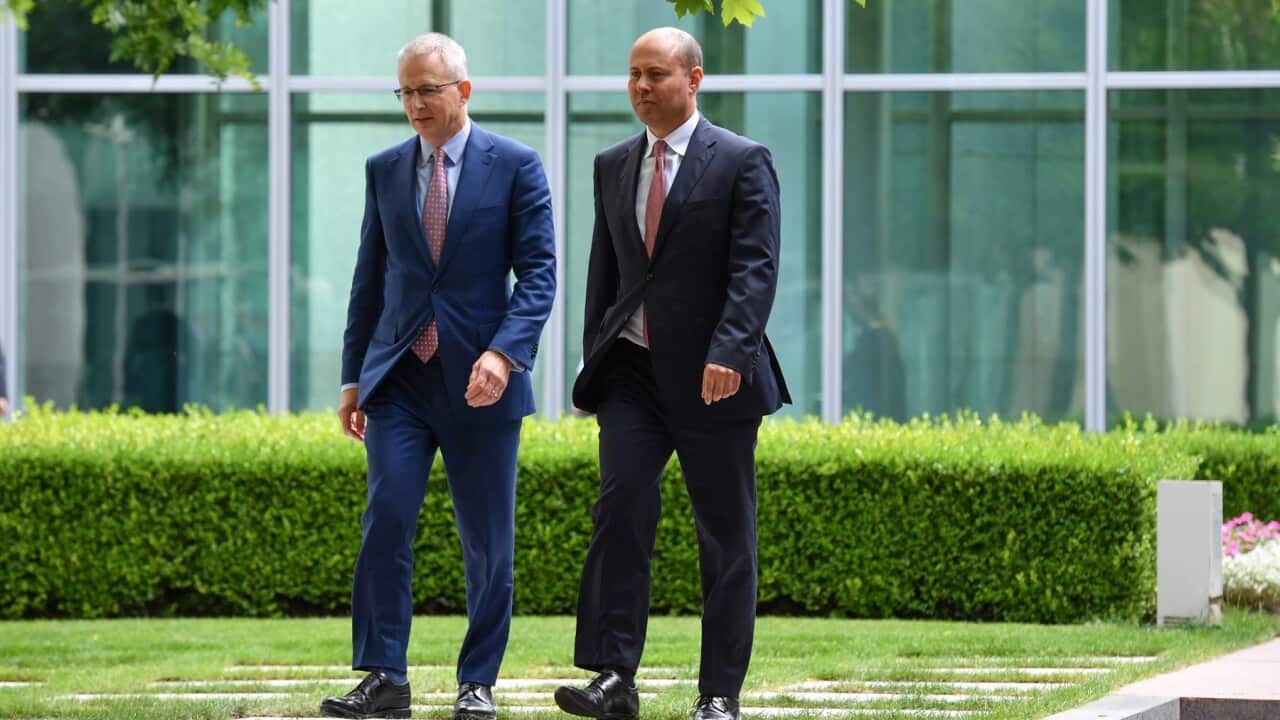 Minister for Communications Paul Fletcher and Treasurer Josh Frydenberg arrive at a press conference at Parliament House in Canberra, Tuesday, February 23, 2021. (AAP Image/Mick Tsikas) NO ARCHIVING
