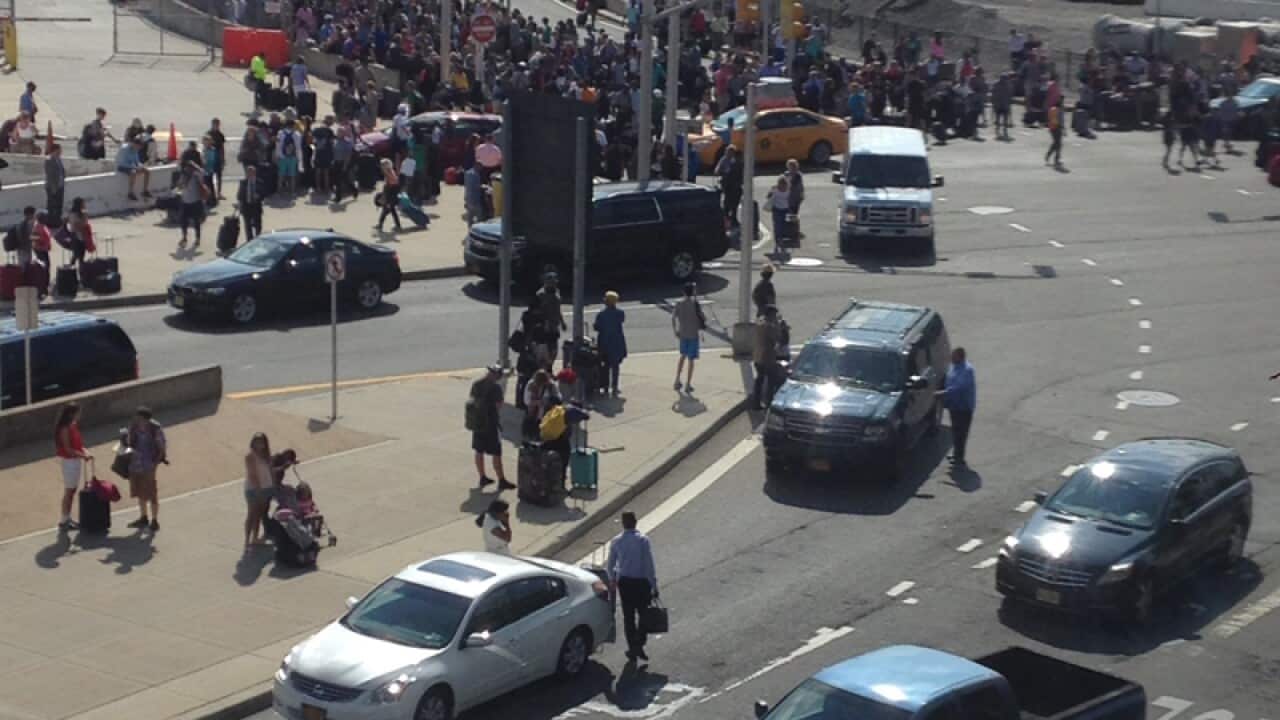 People at New York's John F. Kennedy International Airport