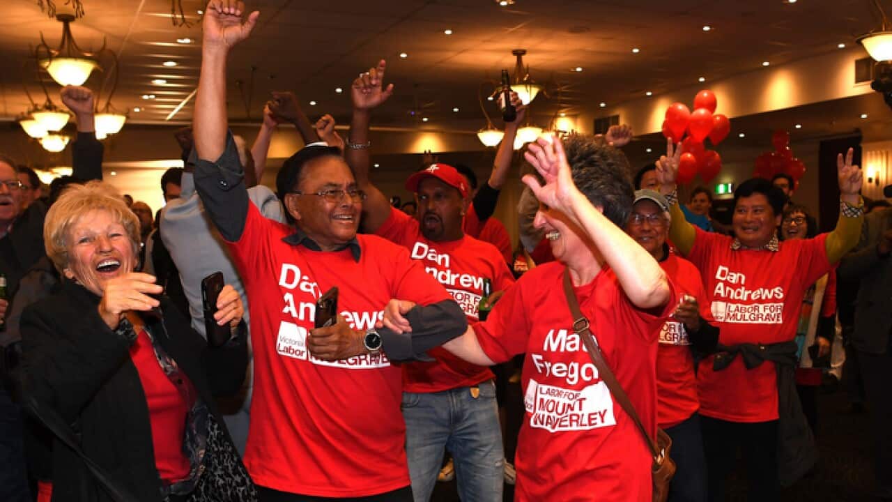 abor supporters react during the Labor Party reception at the Village Green in Mulgrave on Victorian State election night in Melbourne, November 24, 2018.