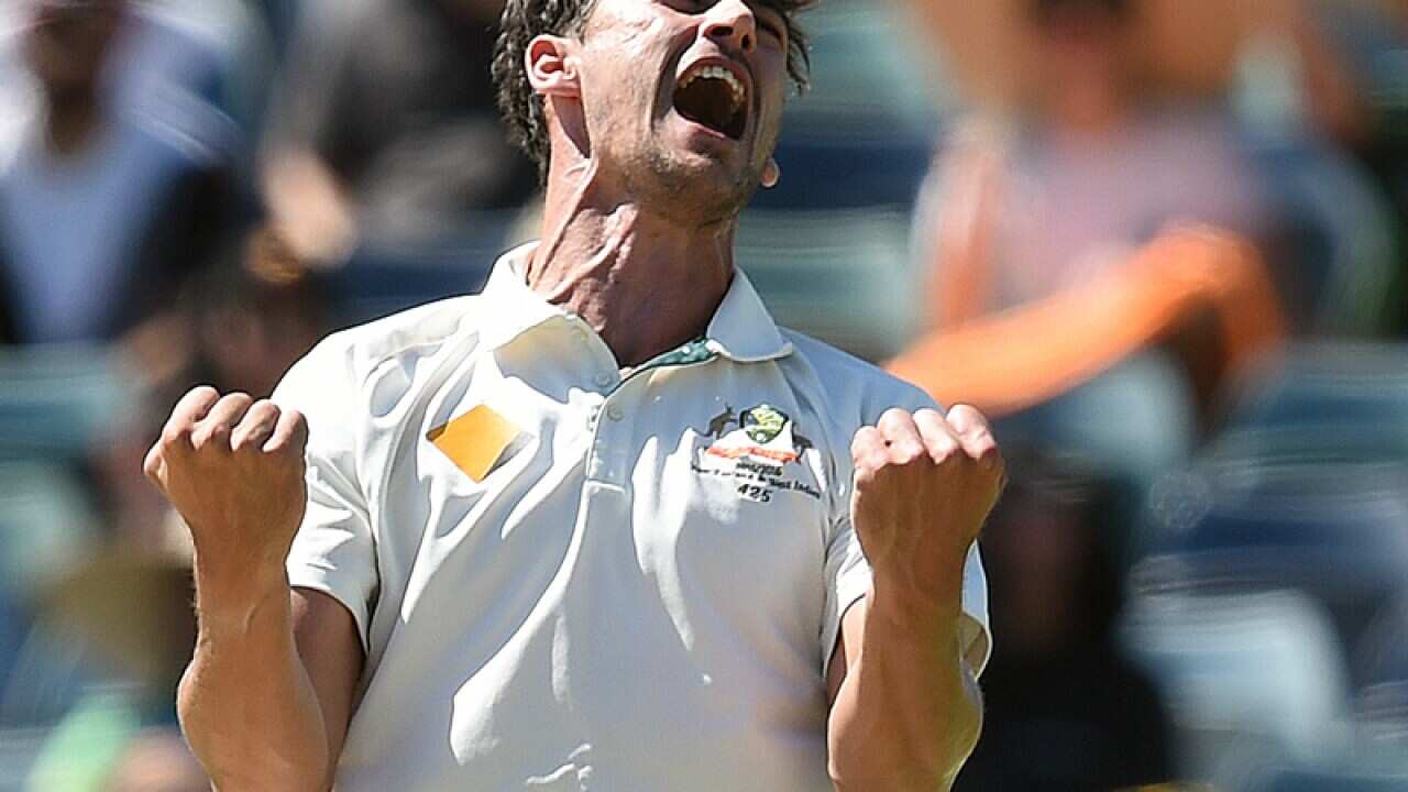 Australian bowler Mitchell Starc reacts in Perth
