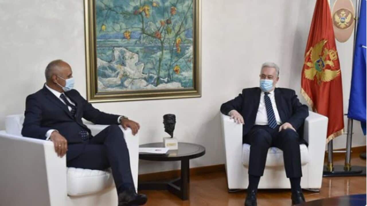 Montenegrin PM with Mayor of Cetinje discussing security after ethic tensions have soared over the scheduled ceremony for Metropolitan Bishop Joanikije II