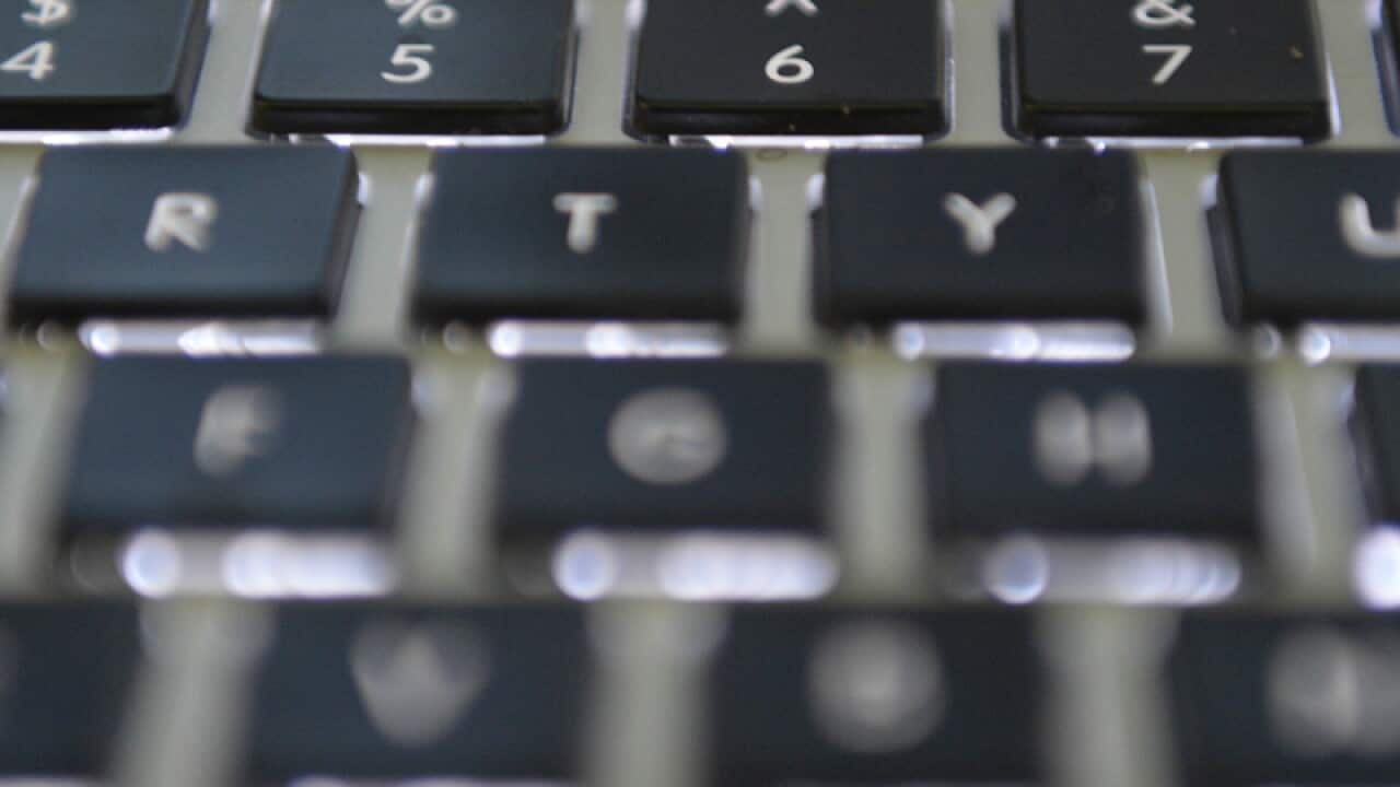 A computer keyboard is seen in Canberra